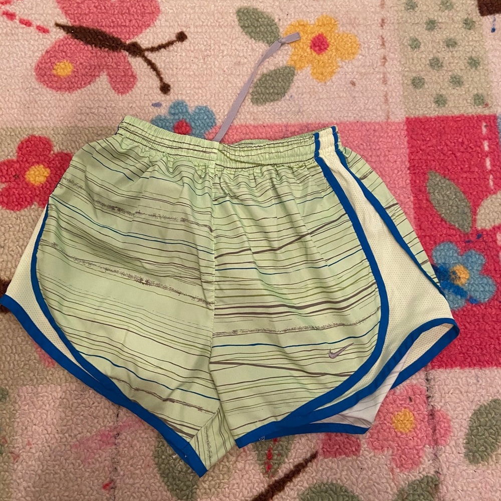 green and blue nike shorts